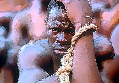 Une homme noir ficelé à la corde de l'esclavage © le film Amistad (1997)