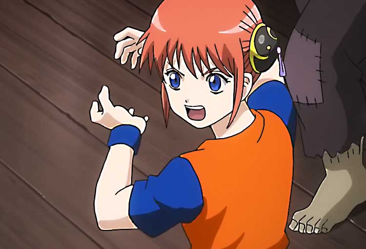 Personnage animé fille, cheveux roux, souriante, fond bois.